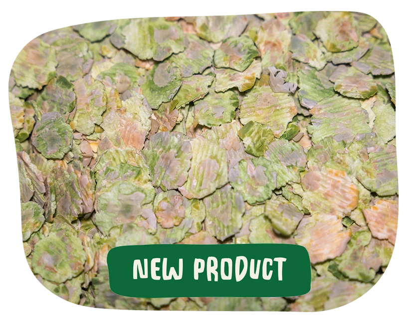 A close up view of The Hay Shed's flaked peas for small pet treats with a caption NEW PRODUCT